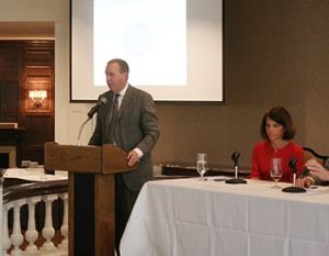 Jeffrey at the podium, with Debbie and Matt (not pictured) on the panel.